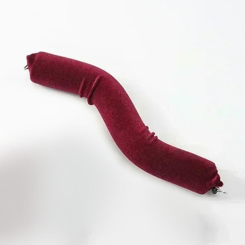 Burgundy heatless curling rod bent into a wave to show how flexible it is